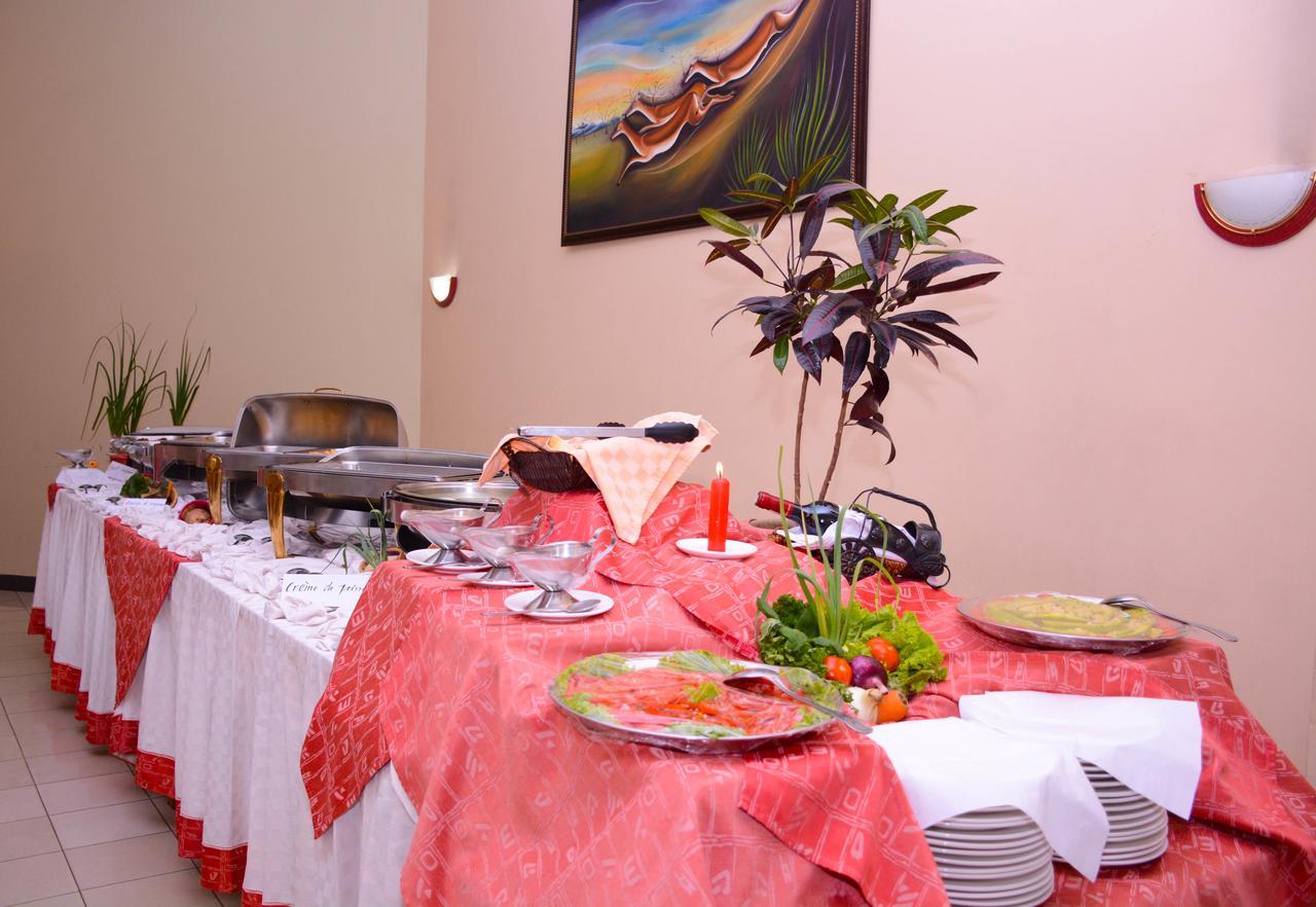 Beausejour Hotel Kigali Bagian luar foto
